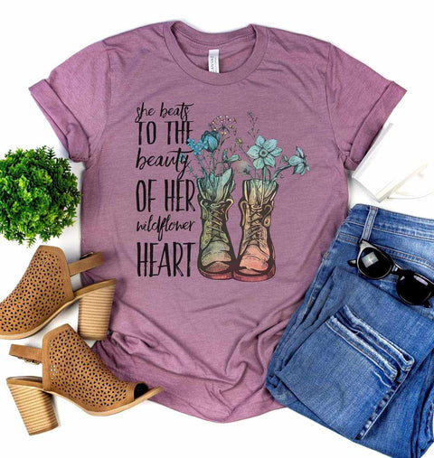 She Beats to the Beauty of Her Wildflower Heart Graphic Tee